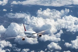 Airplane flying clouds